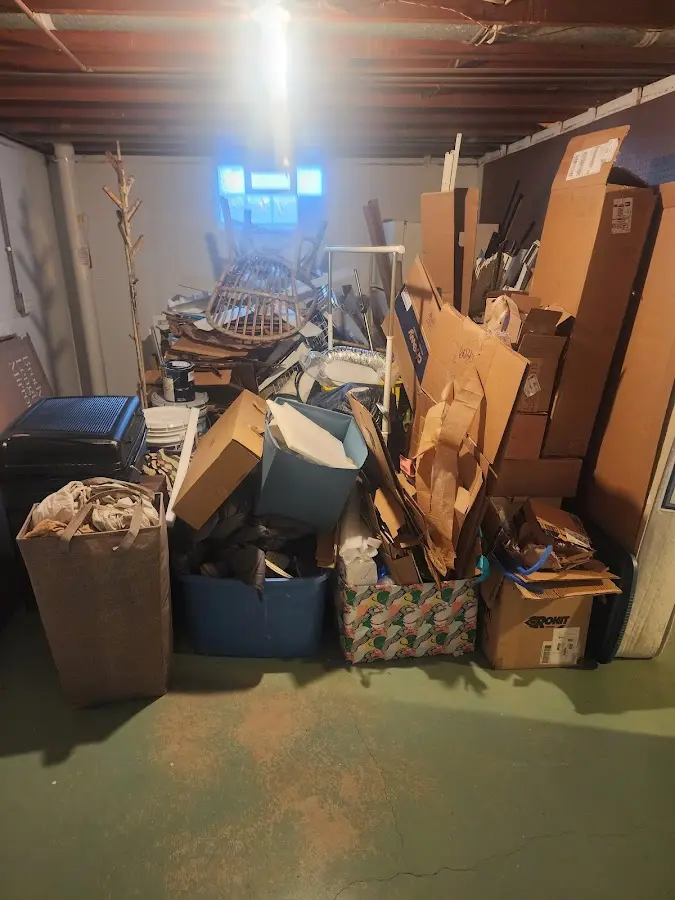 Roll-off dumpster container at job site for Cleanout Dumpster Rental in Missoula